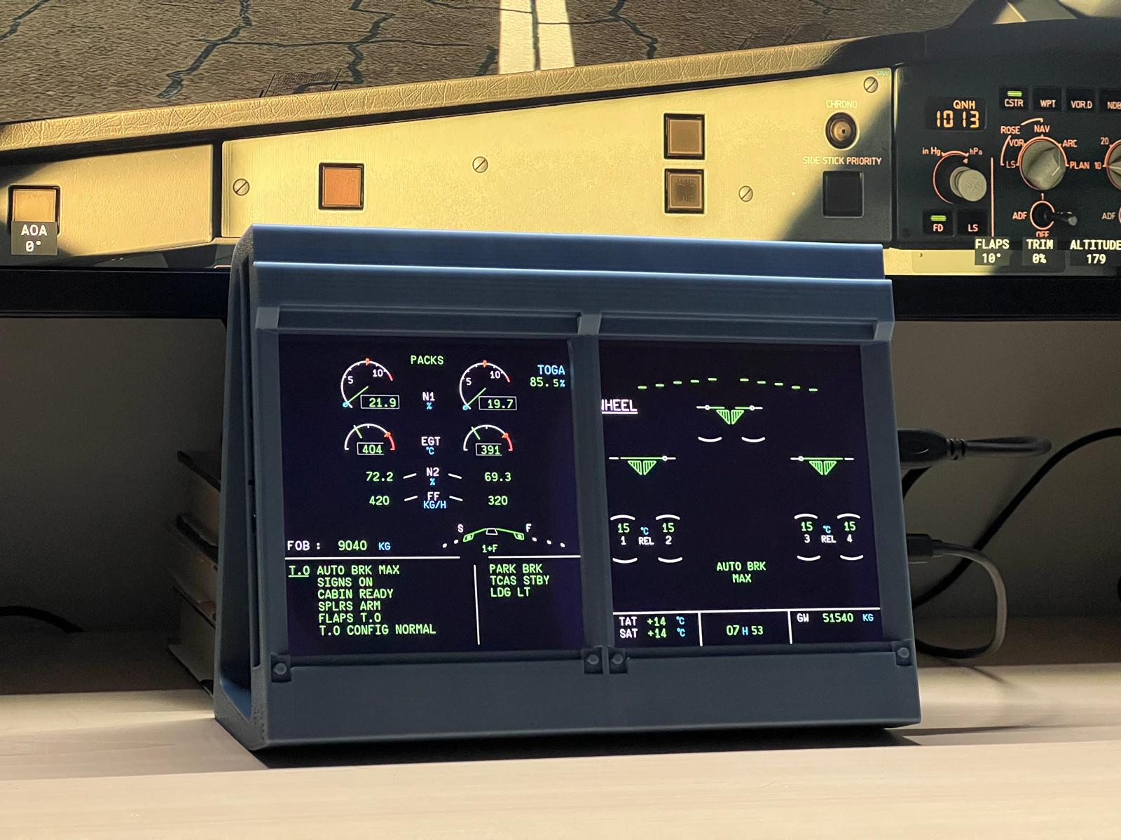 Angled view of IESims ECAM module showing high-resolution display.