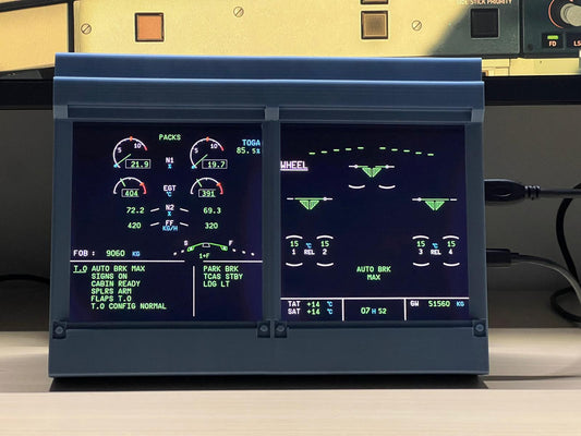 Front-facing view of IESims ECAM flight simulator hardware.